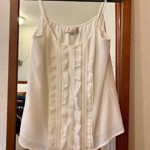 White sleeveless blouse